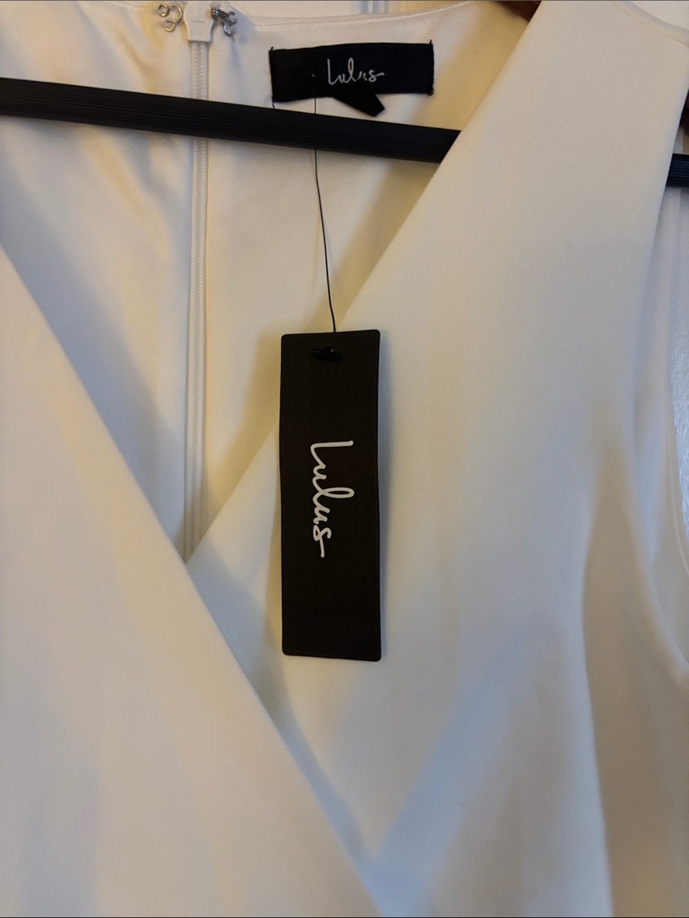 NWT- Lulu's rooftop White Sleeveless Faux-Wrap Belted Skort Romper - Picture 8 of 8